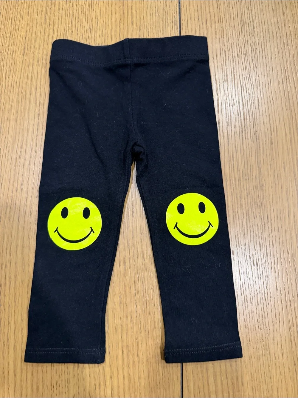 Rock & Candy Black Leggings with Yellow Smiley Knee Decals